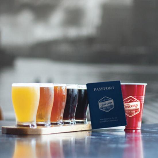 flight of beers on bar with passport and mug from the Concord Beer Trail in Concord CA