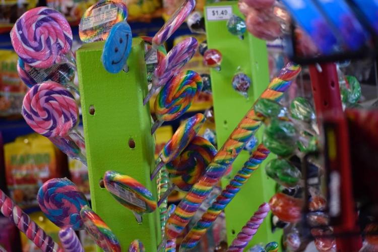 lollipops and other candy on a store display