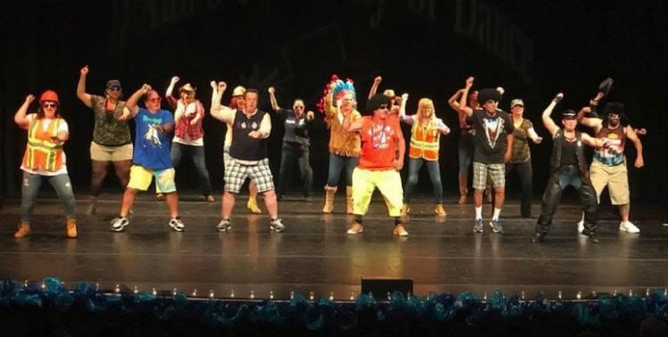 large group of dancer on stage