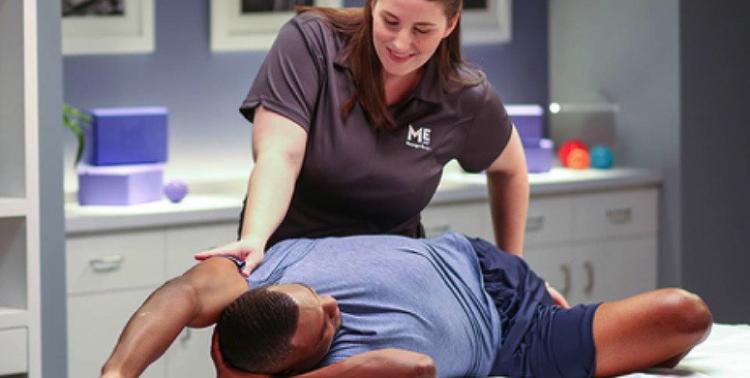 woman giving man a massage