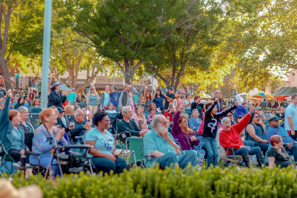 Crowd of people enjoy an outdoor performance in Concord, CA