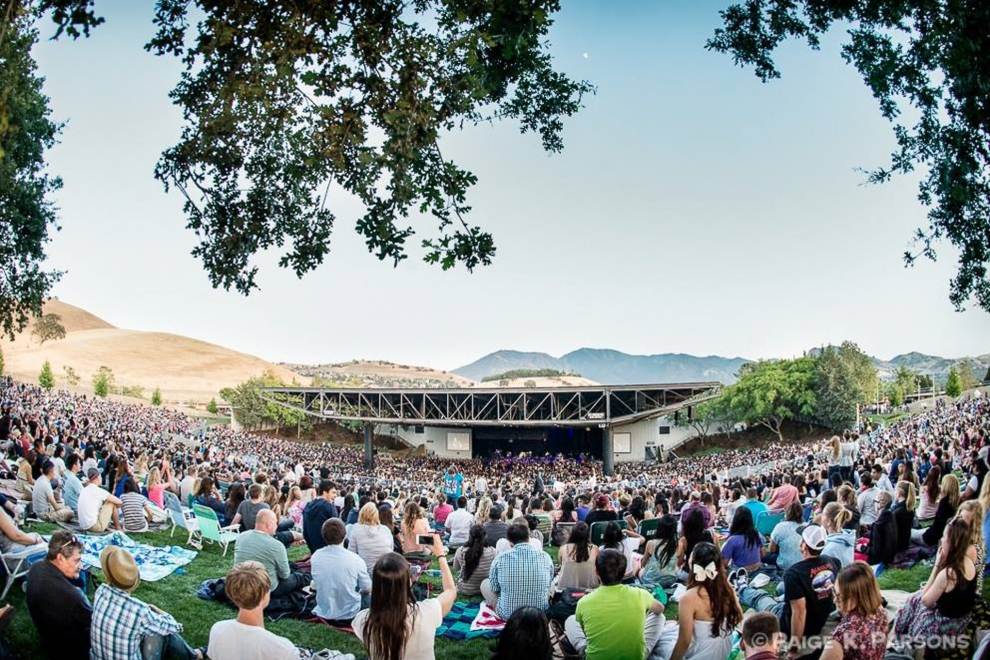 A large lawn full of people at Concord Pavilion